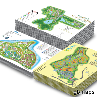 A4 printed holiday park and campsite maps stacked in a pile